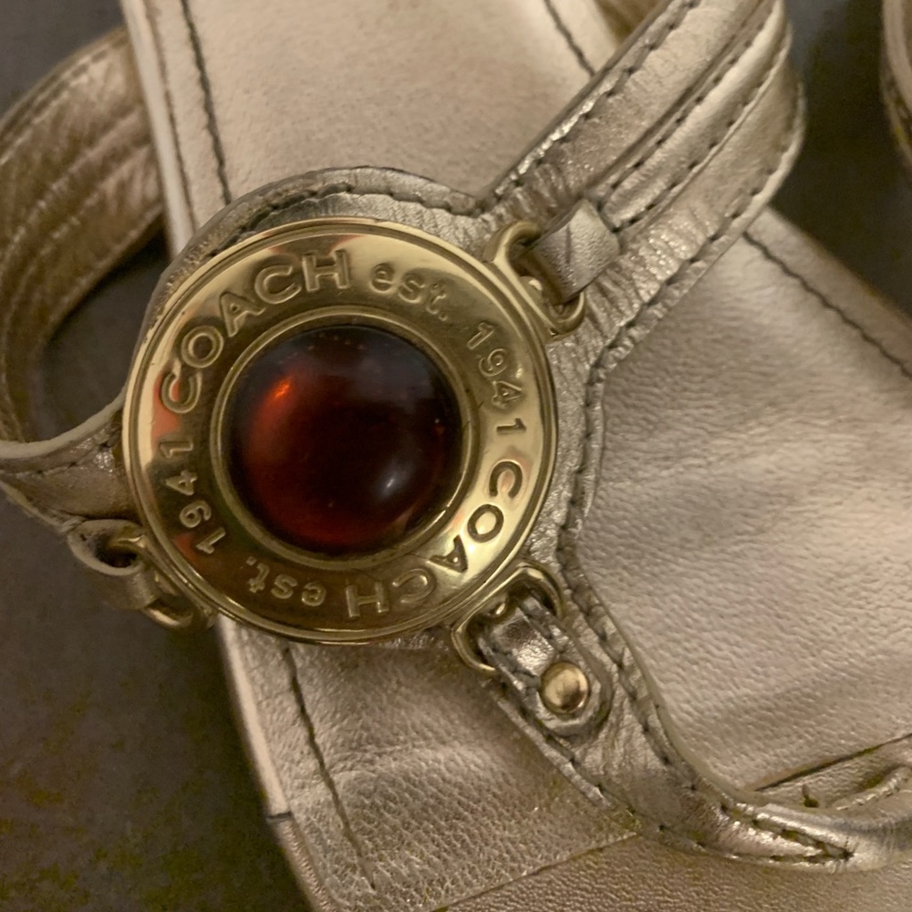 Coach gold sandals with amber stone